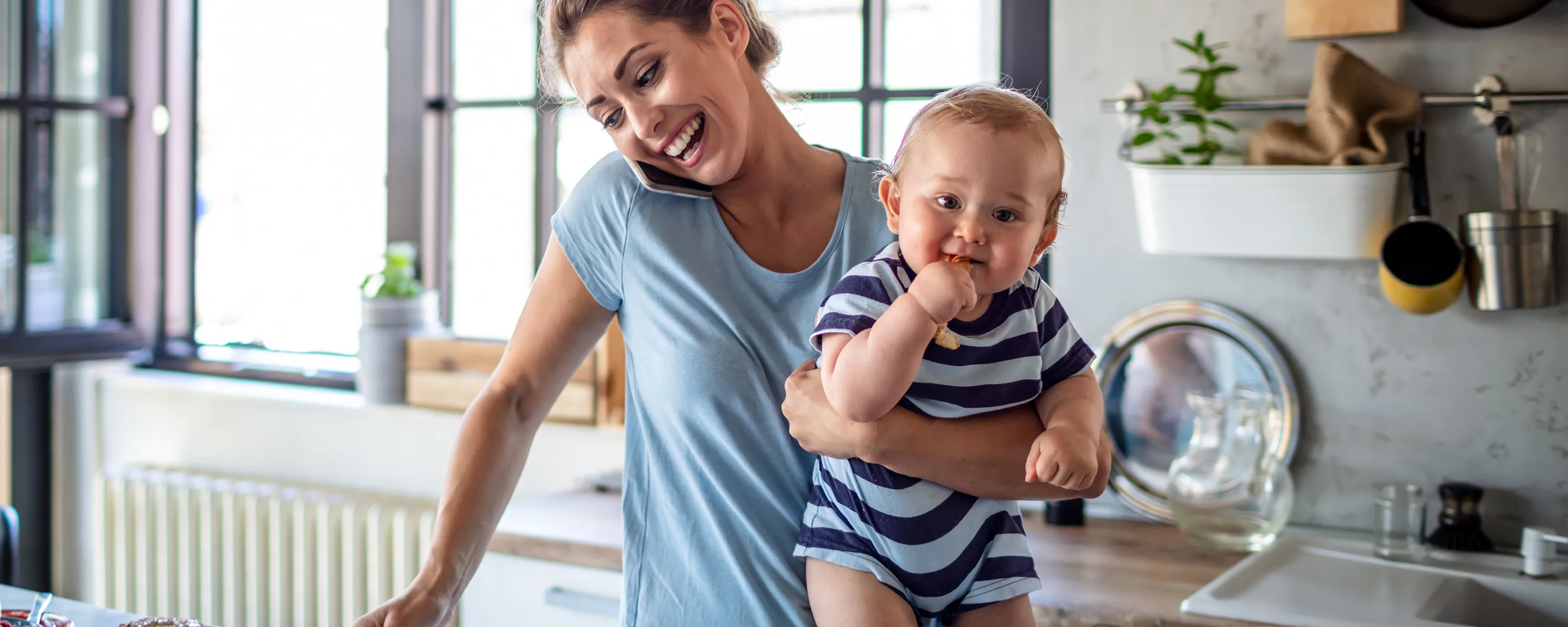 Mom with young child preparing food